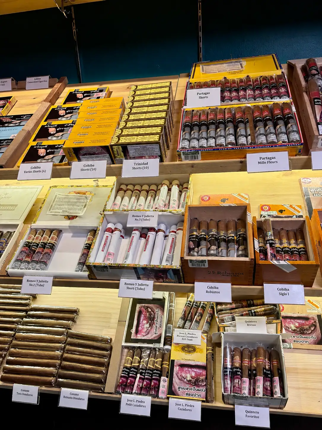 Rows of hand-rolled cigars showing wrapper construction detail