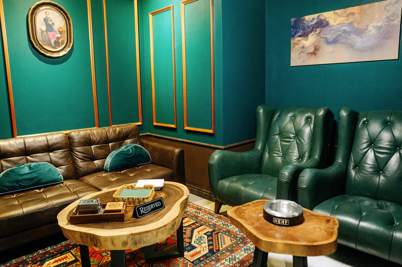 Teal reserved seating nook in the CNX Cigars lounge
